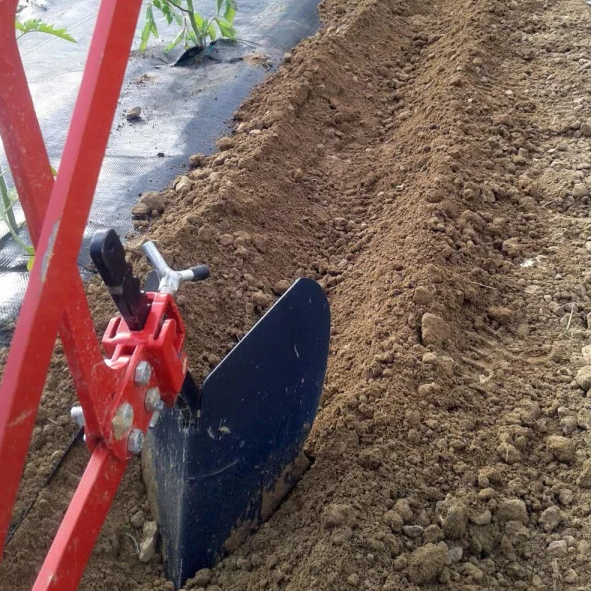 Earthing-up plough